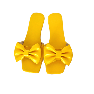 Yellow Bow Slides - Reinventing Glamour