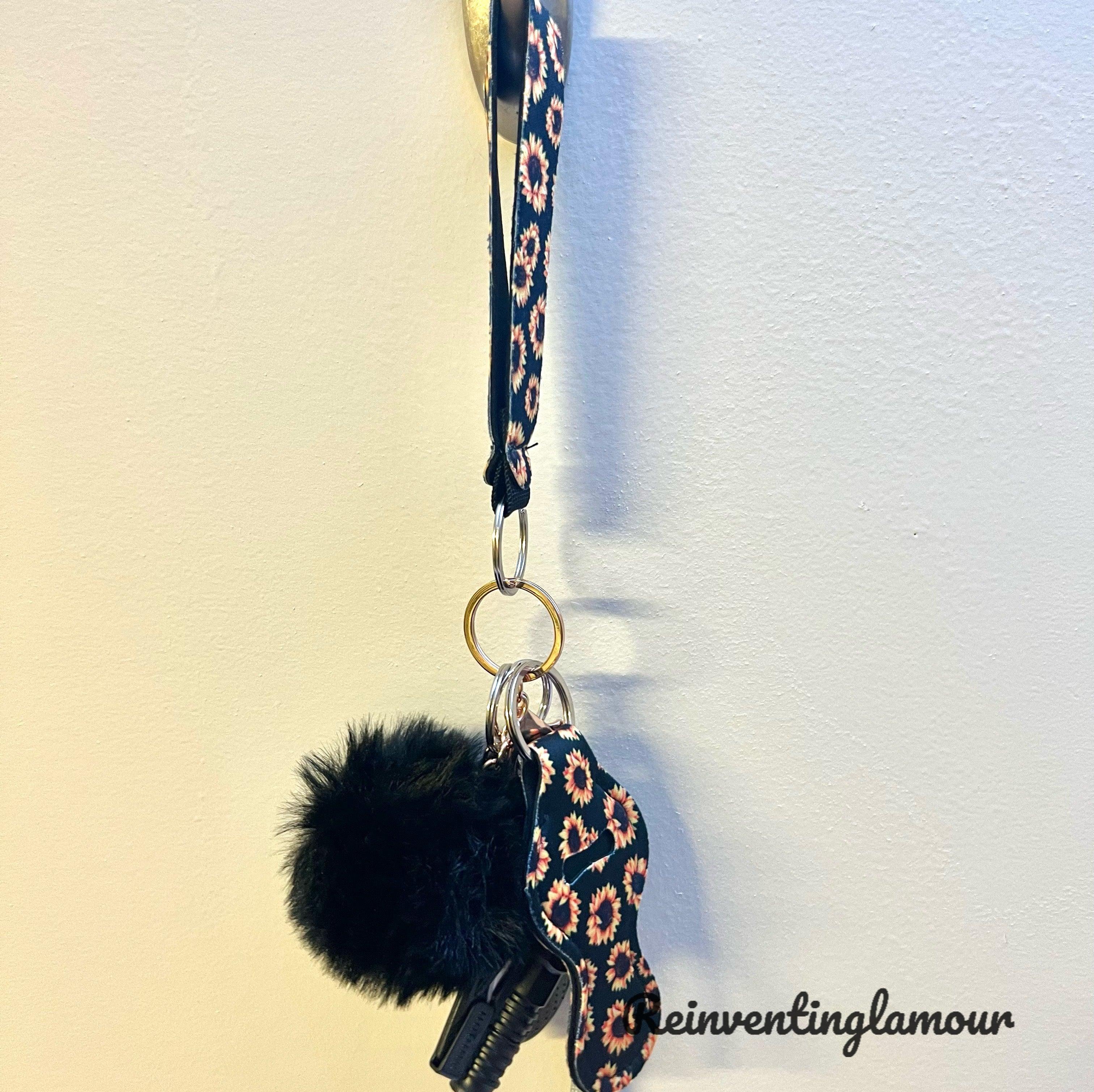 Trendy Black Sunflower “Safety” Keychain – Reinventing Glamour