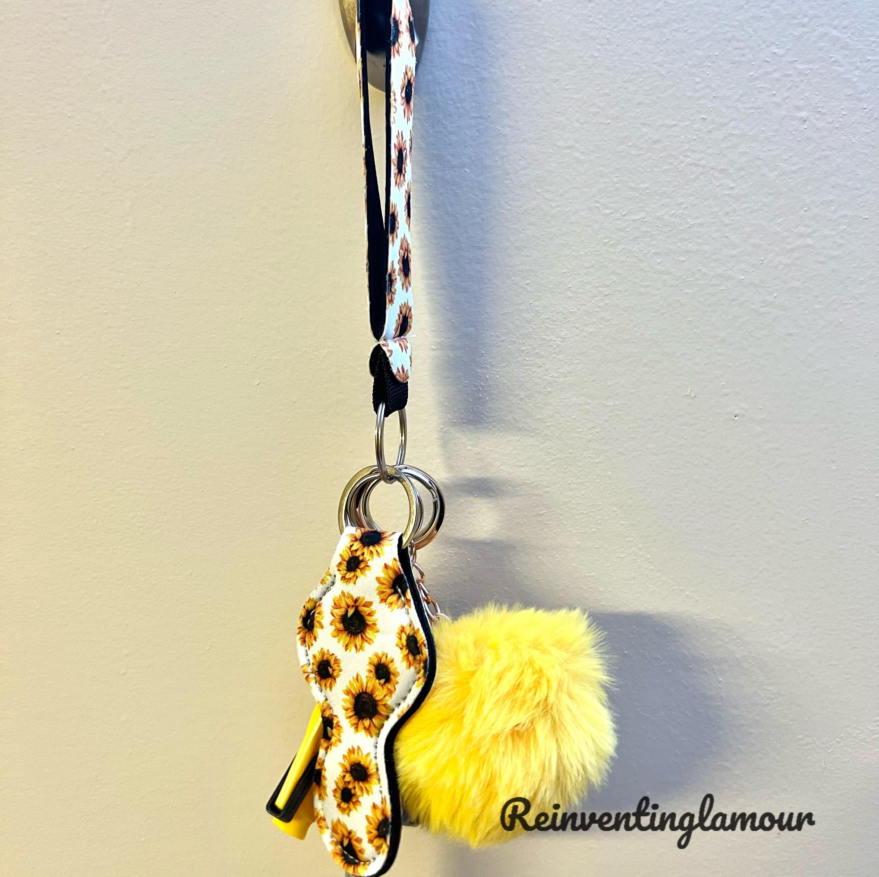 White Sunflower “Safety” Keychain – Reinventing Glamour